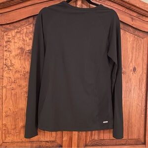 Danskin Active long sleeve black activewear top. Size L